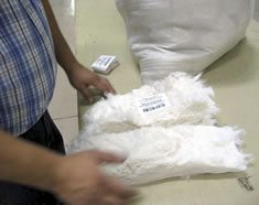 A sample is taken from each side of the bale 